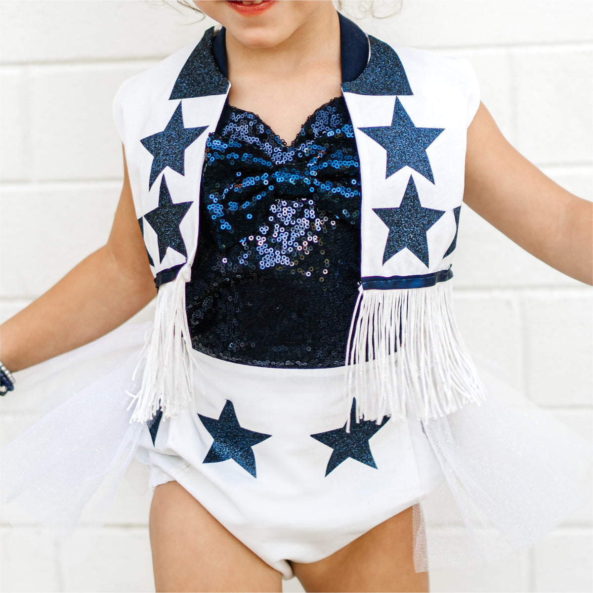 Kids Dallas cowboys cheerleader outfit includes vest, blue top, white  shorts, pom poms. Bows sold separately