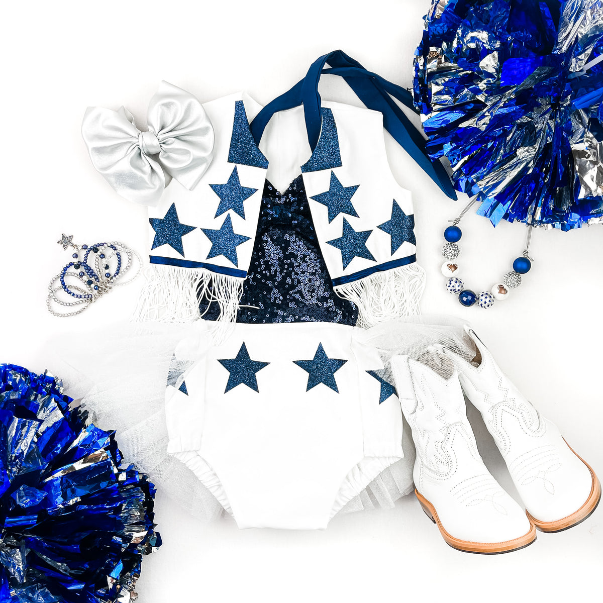 Kids Dallas cowboys cheerleader outfit includes vest, blue top, white  shorts, pom poms. Bows sold separately